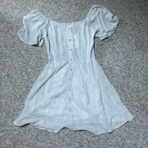 Selling sienna sky dress, white dress with small black dots all along the dress